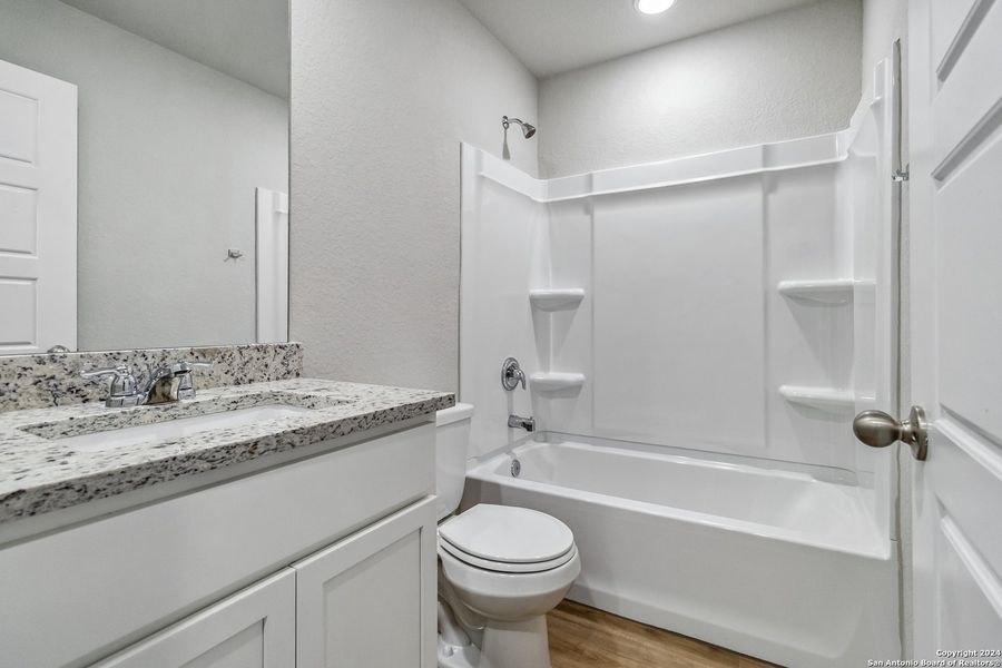 Furnished interior view inside a new home in Abbott Run, San Antonio (Image 10).