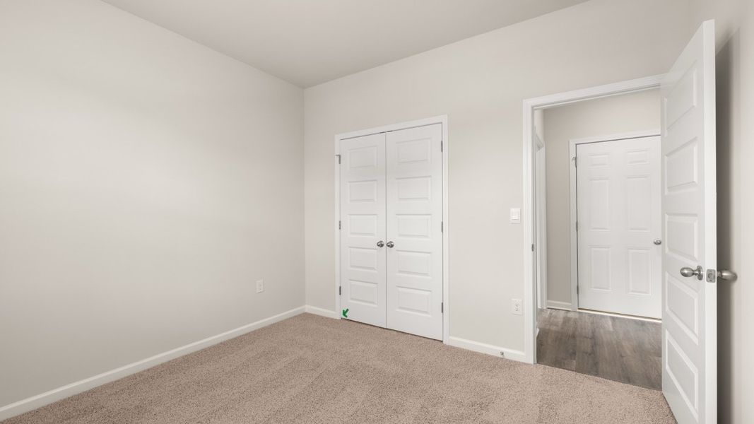 Spacious, unfurnished interior of a new home in Preserve at Dove Creek, Statham (Image 31).