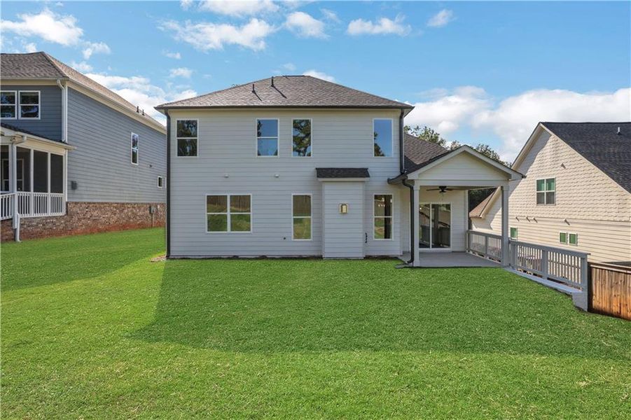Exterior details and patio area of a home in Cambridge, Flowery Branch (Image 20).