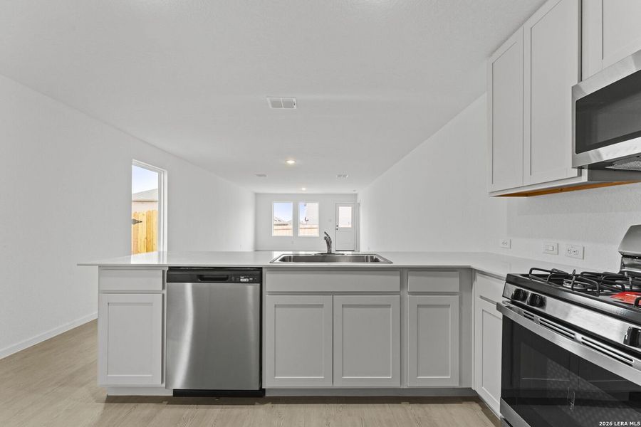 Furnished interior view inside a new home in Randolph Crossing: Cottage Collection, Converse (Image 4). Furnished interior view inside a new home in Randolph Crossing: Cottage Collection, Converse (Image 4).