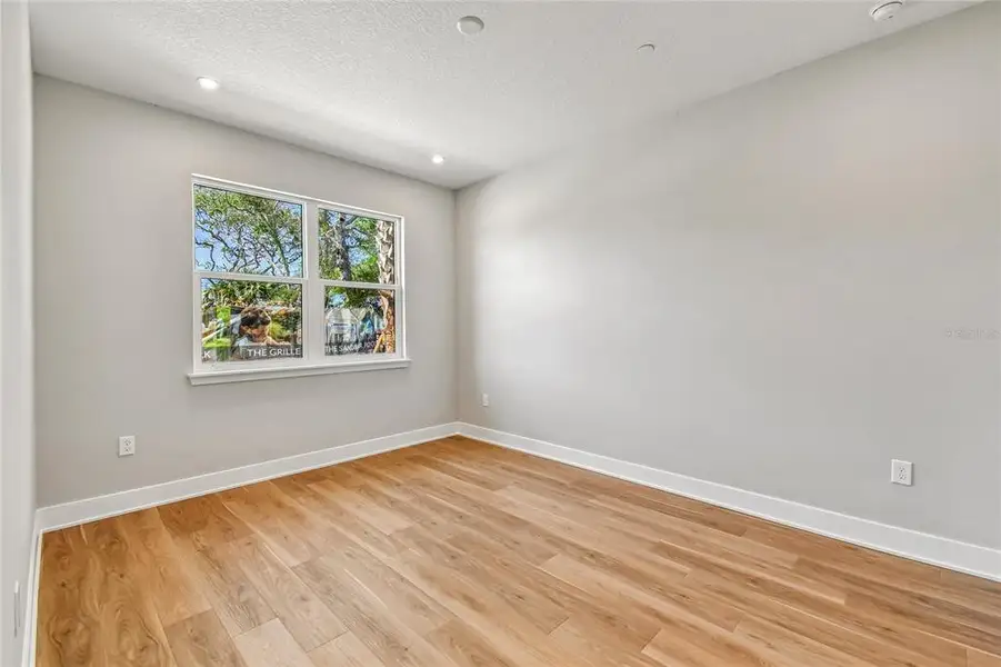 Spacious, unfurnished interior of a new home in EvenTide, New Smyrna Beach (Image 17).