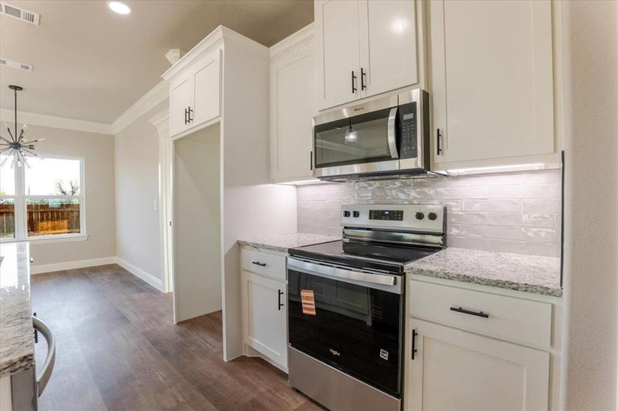 Furnished interior view inside a new home in , Tolar (Image 7).