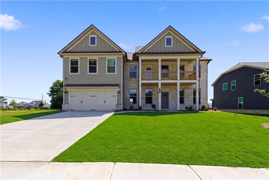 Front exterior of a new home in Grandview at Millers Mill, Stockbridge, GA, highlighting curb appeal (Image 1). Front exterior of a new home in Grandview at Millers Mill, Stockbridge, GA, highlighting curb appeal (Image 1).