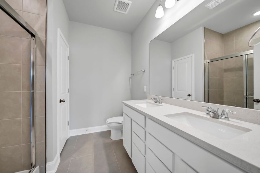 Furnished interior view inside a new home in Monroe Preserve, Chapin (Image 11).