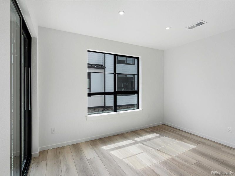 Spacious, unfurnished interior of a new home in The Hub at Virginia Village, Denver (Image 12).