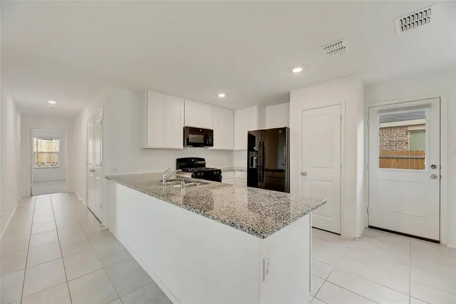 Furnished interior view inside a new home in , Forney (Image 4). Furnished interior view inside a new home in , Forney (Image 4).