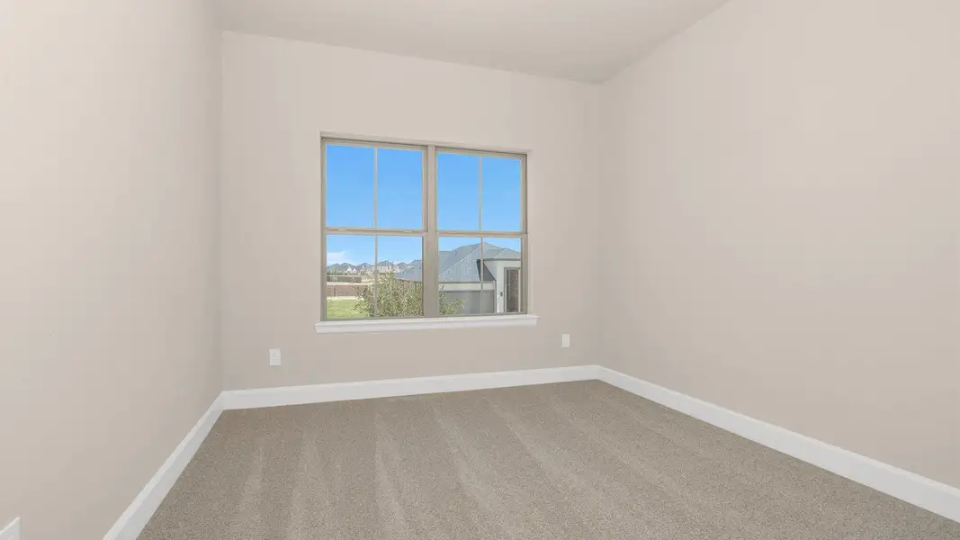 Spacious, unfurnished interior of a new home in Legacy Prairie at Katy Court, Katy (Image 12).