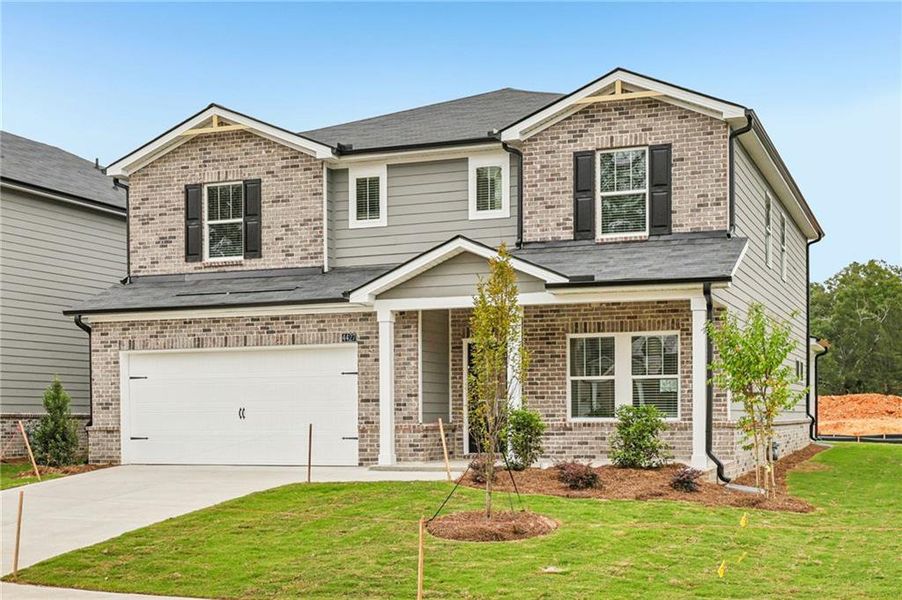 Front exterior of a new home in Westmont Preserve, Powder Springs, GA, highlighting curb appeal (Image 28).