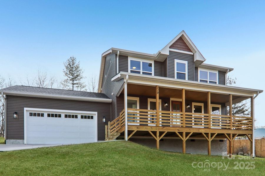 Front exterior of a new home in , Candler, NC, highlighting curb appeal (Image 2).