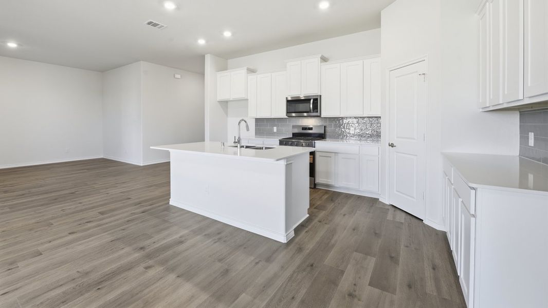 Furnished interior view inside a new home in The Woods at Lindsey Place, Anna (Image 4).
