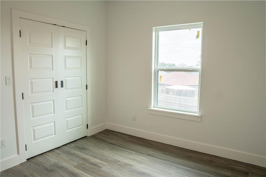 Spare room with light hardwood / wood-style flooring