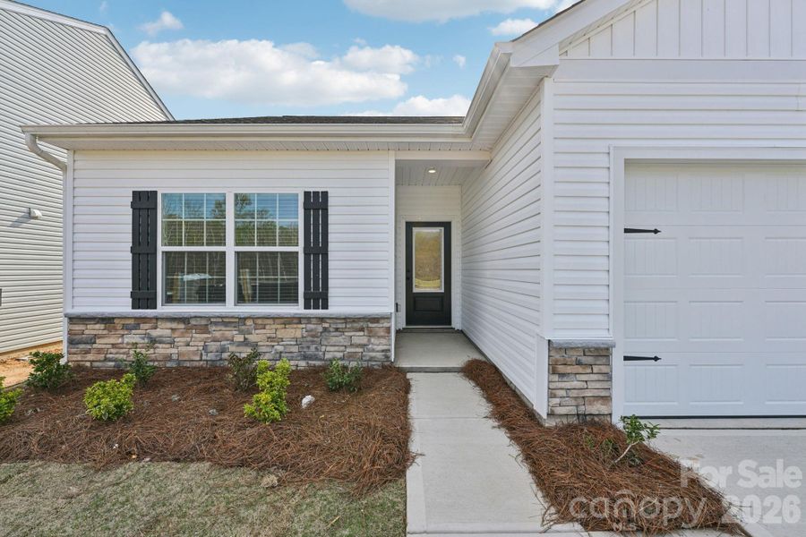 Exterior details and patio area of a home in Willow Estates, Shelby (Image 23).
