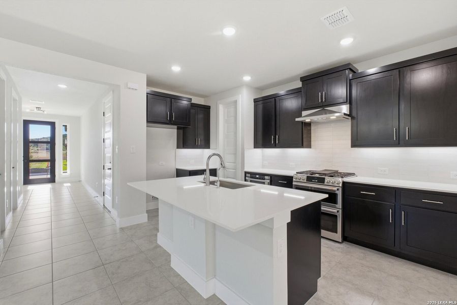 Furnished interior view inside a new home in Crown Ridge Manor, San Antonio (Image 8).