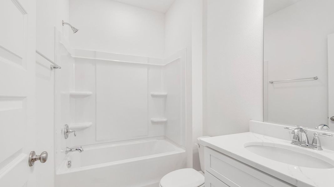 Furnished interior view inside a new home in Bayside at Ward Creek, Panama City Beach (Image 16).