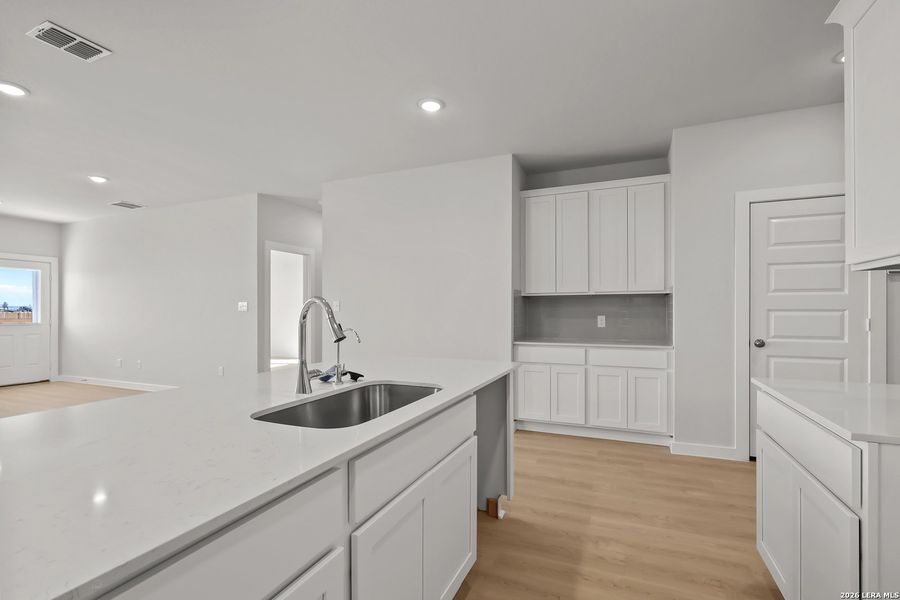 Furnished interior view inside a new home in Cinco Lakes, San Antonio (Image 5).