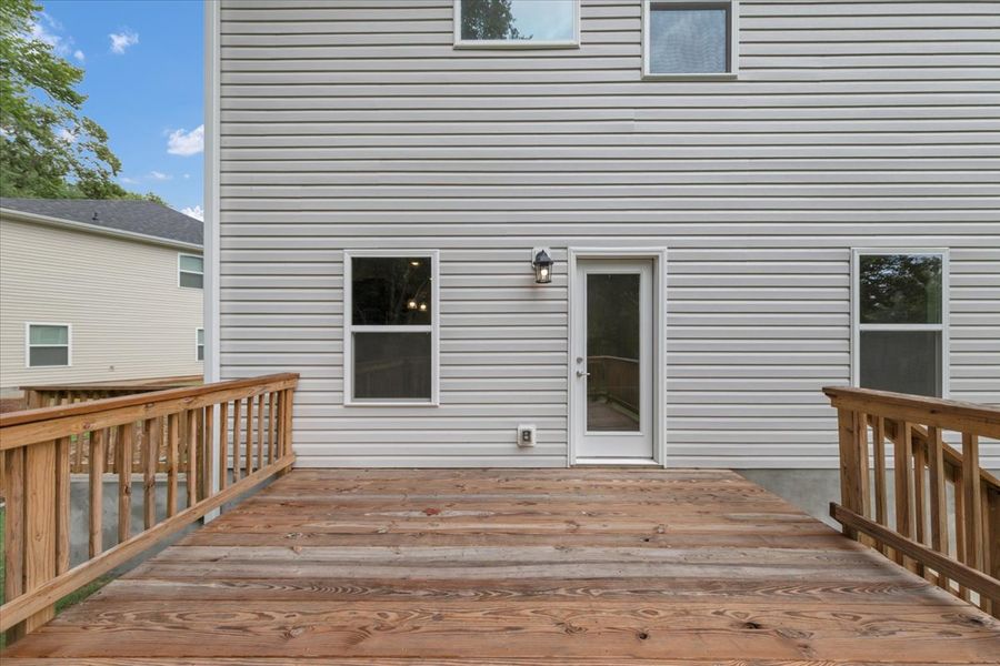 Exterior details and patio area of a home in Scarlett Place, Bowdon (Image 22).