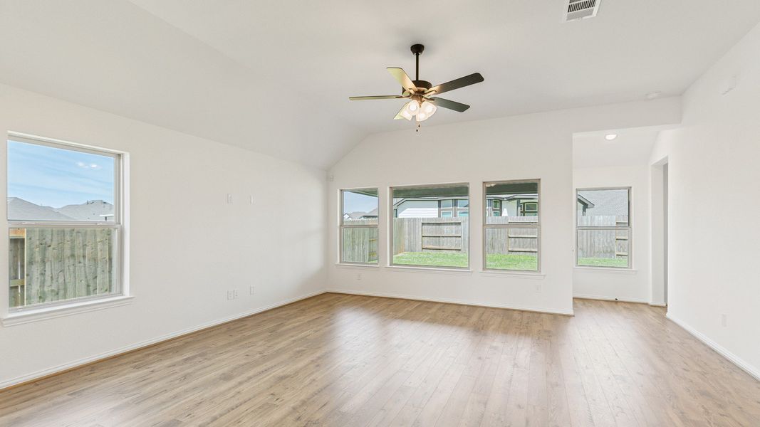 Furnished interior view inside a new home in Sunterra, Katy (Image 15).