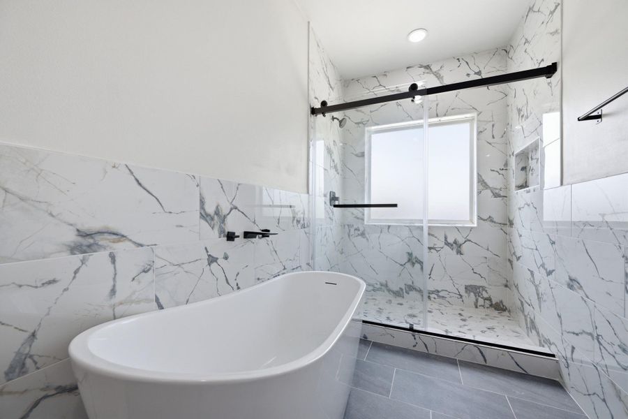 Ensuite bathroom with dual sinks, soaking tub and oversized shower Ensuite bathroom with dual sinks, soaking tub and oversized shower
