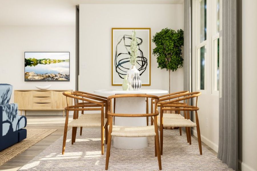 A dining room with a table and chairs.