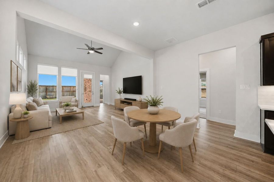 Spacious living room filled with natural light and views of the backyard. *Photo is virtually staged* Spacious living room filled with natural light and views of the backyard. *Photo is virtually staged*