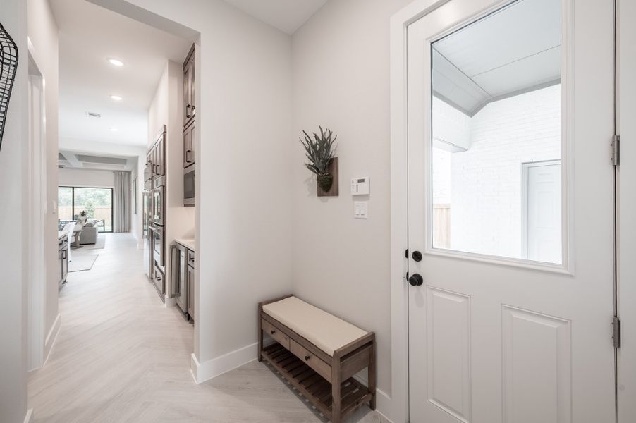 Representative furnished interior of a home built from the Carignan by Tri Pointe Homes in Sienna 80′, Missouri City (Image 16).
