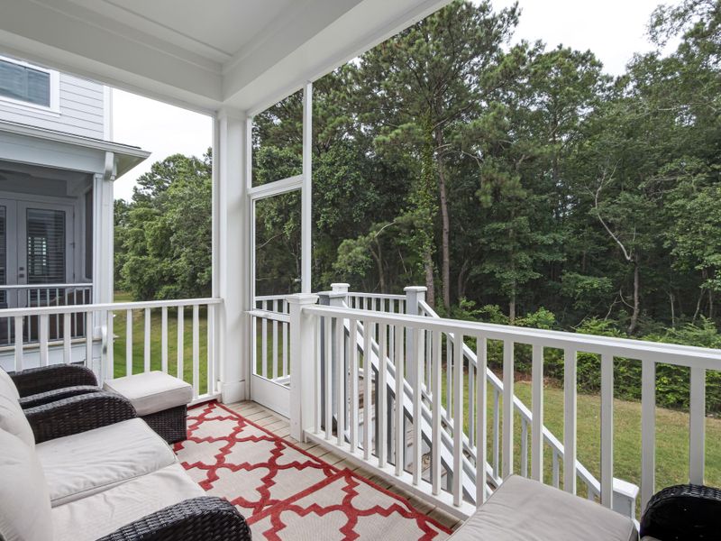 Exterior details and patio area of a home in Overlook at Copahee Sound, Awendaw (Image 27).