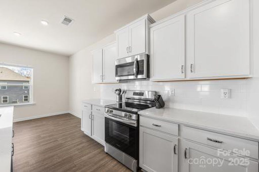 Furnished interior view inside a new home in Wilora Pond, Charlotte (Image 9). Furnished interior view inside a new home in Wilora Pond, Charlotte (Image 9).