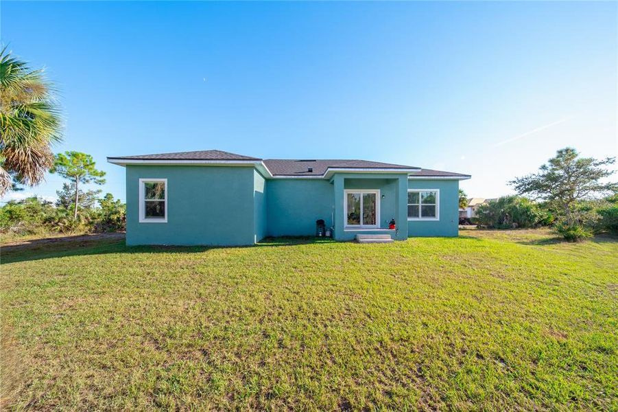 Exterior details and patio area of a home in , Port Charlotte (Image 2). Exterior details and patio area of a home in , Port Charlotte (Image 2).