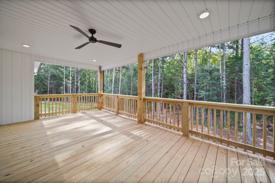 Large covered patio overlooking your private wooded back yard. Large covered patio overlooking your private wooded back yard.