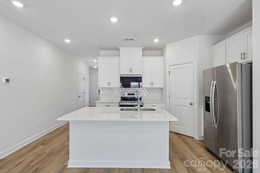 Photo is not of the actual home, but is an inspirational photo of builder’s model home and may depict options, furnishings, and/or decorator features that are not included Photo is not of the actual home, but is an inspirational photo of builder’s model home and may depict options, furnishings, and/or decorator features that are not included