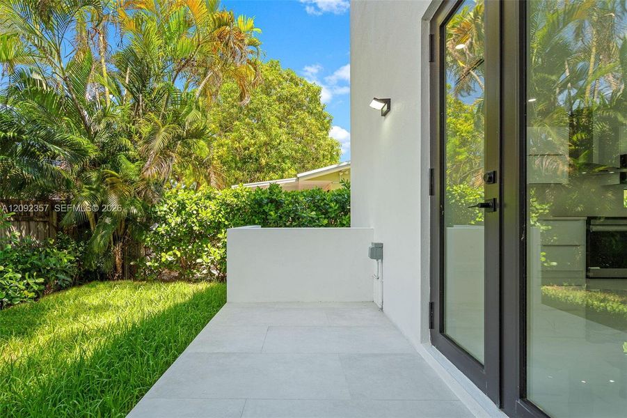 Exterior details and patio area of a home in , Miami (Image 24).