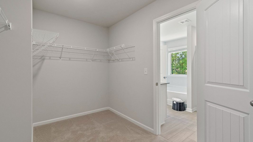 Representative furnished interior of a home built from the Reagan by DRB Homes in Towne Center, Hampton (Image 14).