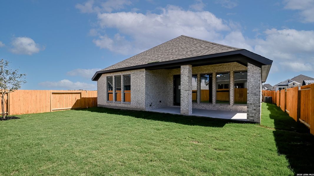 Exterior details and patio area of a home in Meadows of Mill Creek, Seguin (Image 3).