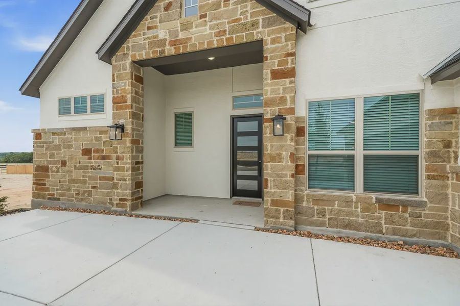 Representative exterior details of a home built from the Stafford by Chesmar Homes in Prominence 60's, San Antonio (Image 4). Representative exterior details of a home built from the Stafford by Chesmar Homes in Prominence 60's, San Antonio (Image 4).