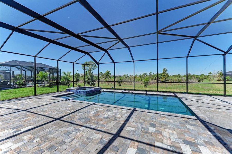 Exterior details and patio area of a home in EVERLY at Wellen Park, Venice (Image 24).