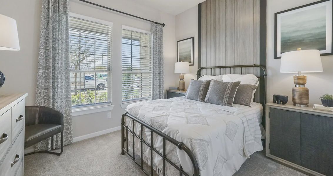 Representative furnished interior of a home built from the Medina by Chesmar Homes in Sienna, Missouri City (Image 10).