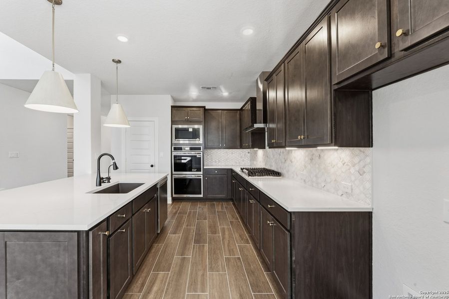 Furnished interior view inside a new home in Davis Ranch 60', San Antonio (Image 7).