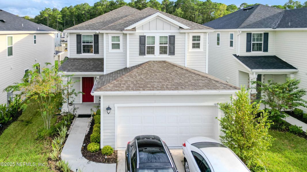 Front exterior of a new home in , St. Johns, FL, highlighting curb appeal (Image 18).