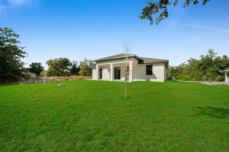 Front exterior of a new home in , Englewood, FL, highlighting curb appeal (Image 2).
