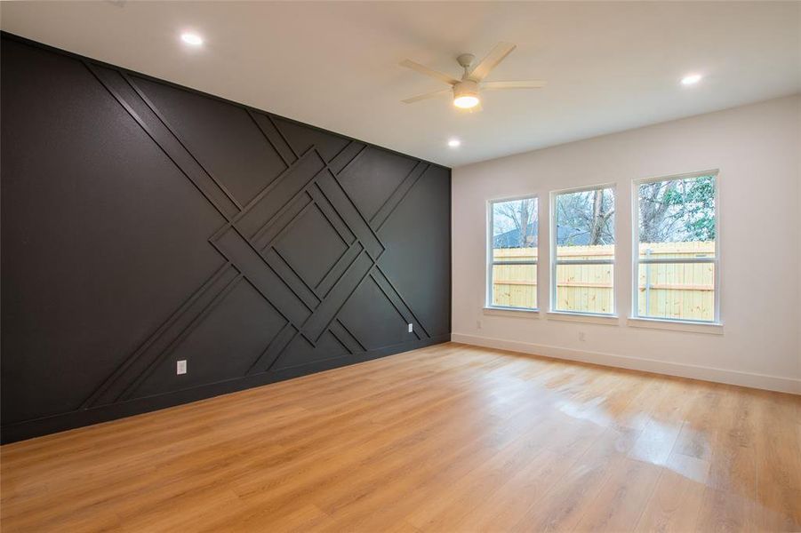 Oversized Primary Bedroom with Striking Accent Wall!