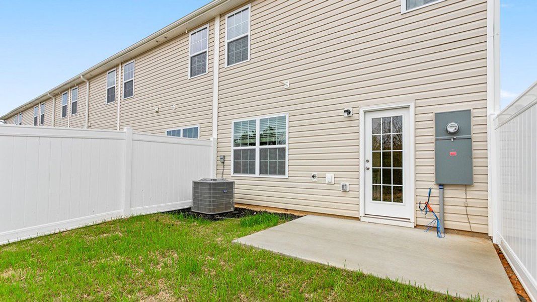 Exterior details and patio area of a home in Henley Ridge, Graham (Image 2). Exterior details and patio area of a home in Henley Ridge, Graham (Image 2).