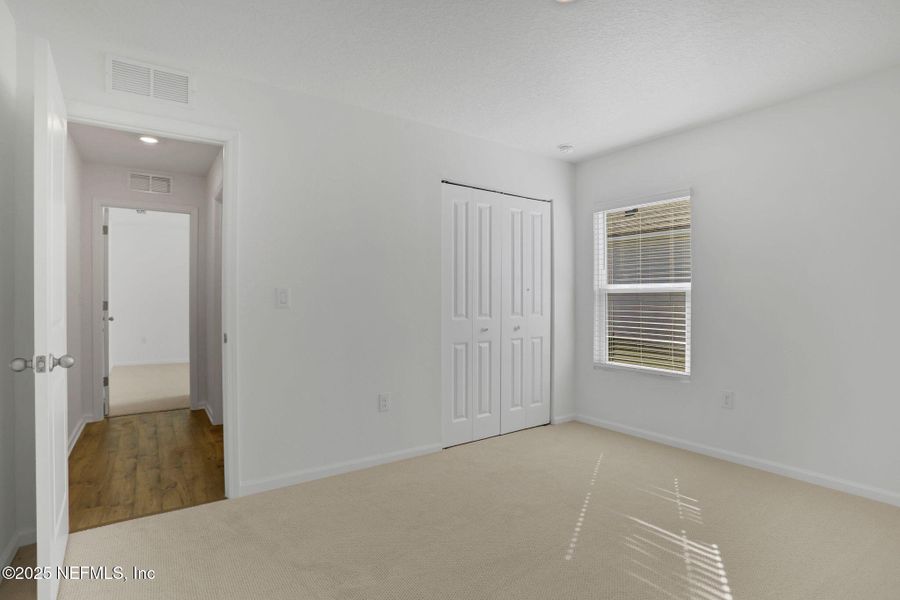Spacious, unfurnished interior of a new home in Cordova Palms, St. Augustine (Image 16).
