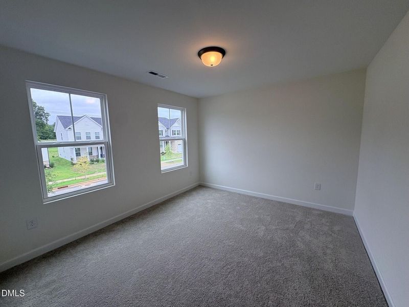 Spacious, unfurnished interior of a new home in Woodland Crossing, Zebulon (Image 22).