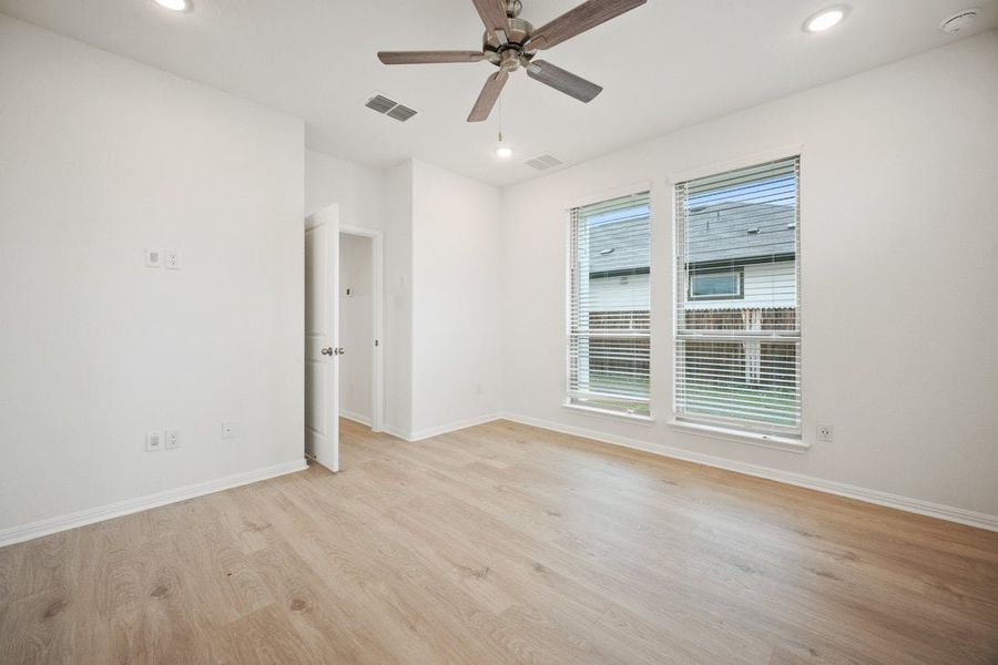 Spacious, unfurnished interior of a new home in The Hills of Bear Creek, Manchaca (Image 35).