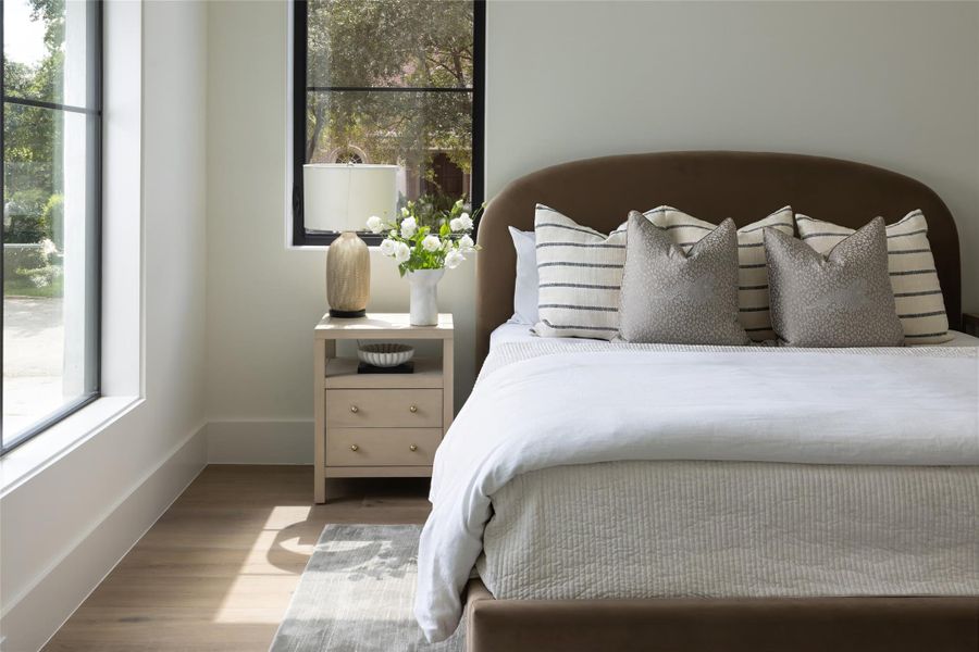 This spacious downstairs guest suite is one of five bedrooms, each featuring its own private en-suite bath. This spacious downstairs guest suite is one of five bedrooms, each featuring its own private en-suite bath.