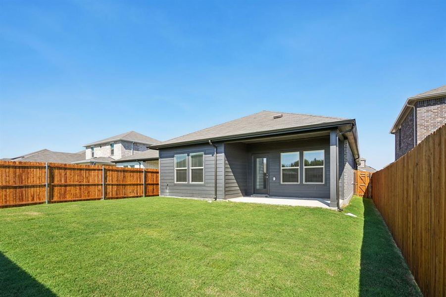 Exterior details and patio area of a home in Simpson Crossing - Spring Series, McKinney (Image 23). Exterior details and patio area of a home in Simpson Crossing - Spring Series, McKinney (Image 23).