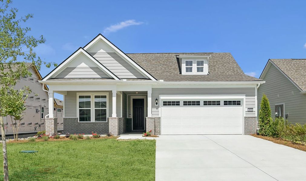 Front exterior of a new home in Del Webb Southern Harmony, Murfreesboro, TN, highlighting curb appeal (Image 28).
