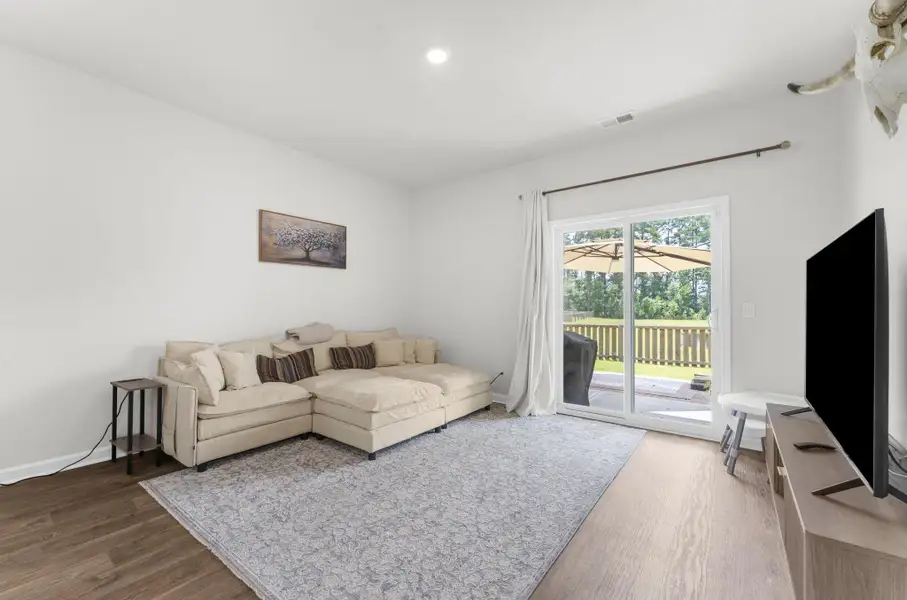 Furnished interior view inside a new home in Pine Hills at Cane Bay, Summerville (Image 30).