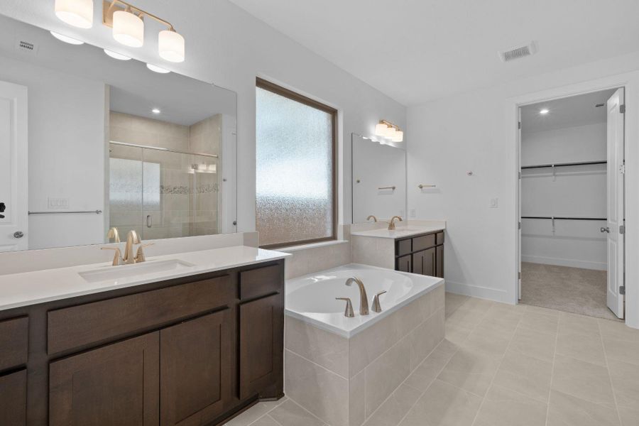 Primary Bath retreat with dual vanities & garden tub