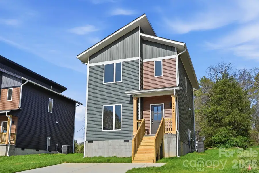 Front exterior of a new home in , Albemarle, NC, highlighting curb appeal (Image 1). Front exterior of a new home in , Albemarle, NC, highlighting curb appeal (Image 1).